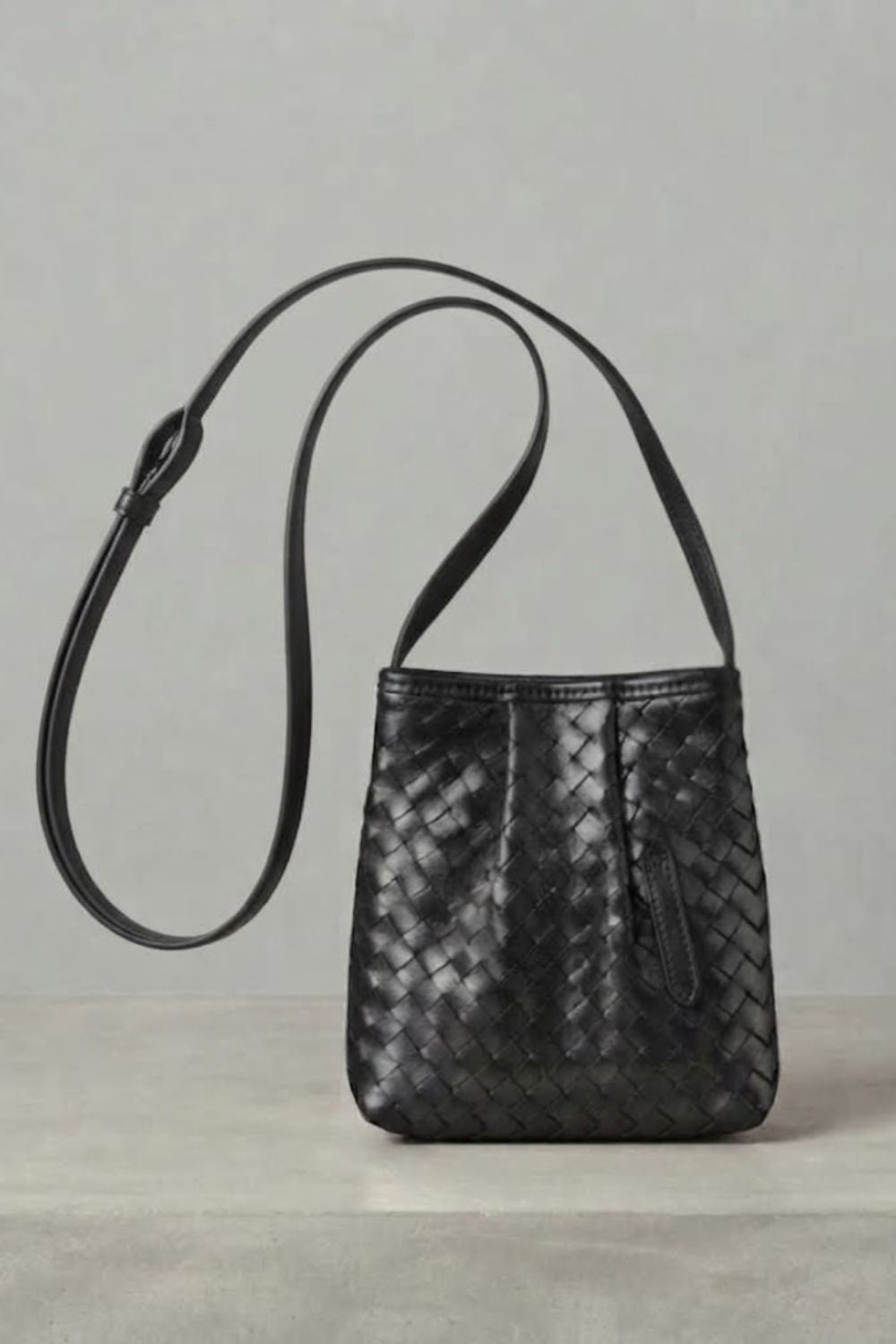 Nappa Mini woven nappa leather crossbody bag in Black, front view — Biche Maison Dréan