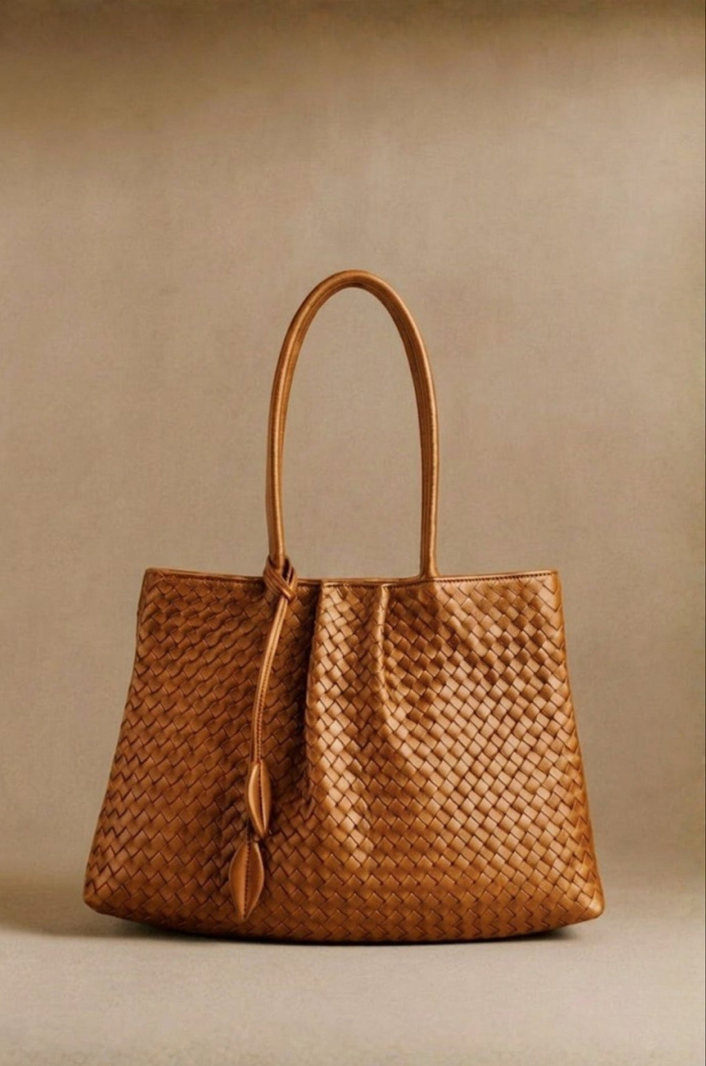 Nappa Grande woven leather tote in cognac, front view — Biche Maison Dréan
