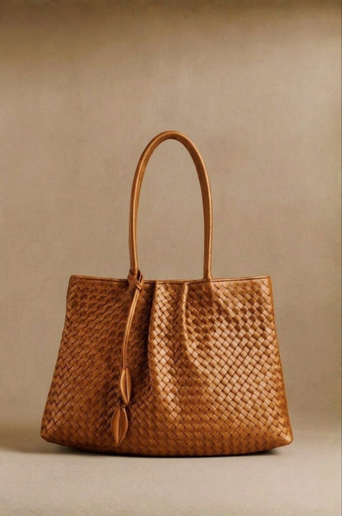 Nappa Grande woven leather tote in cognac, front view — Biche Maison Dréan
