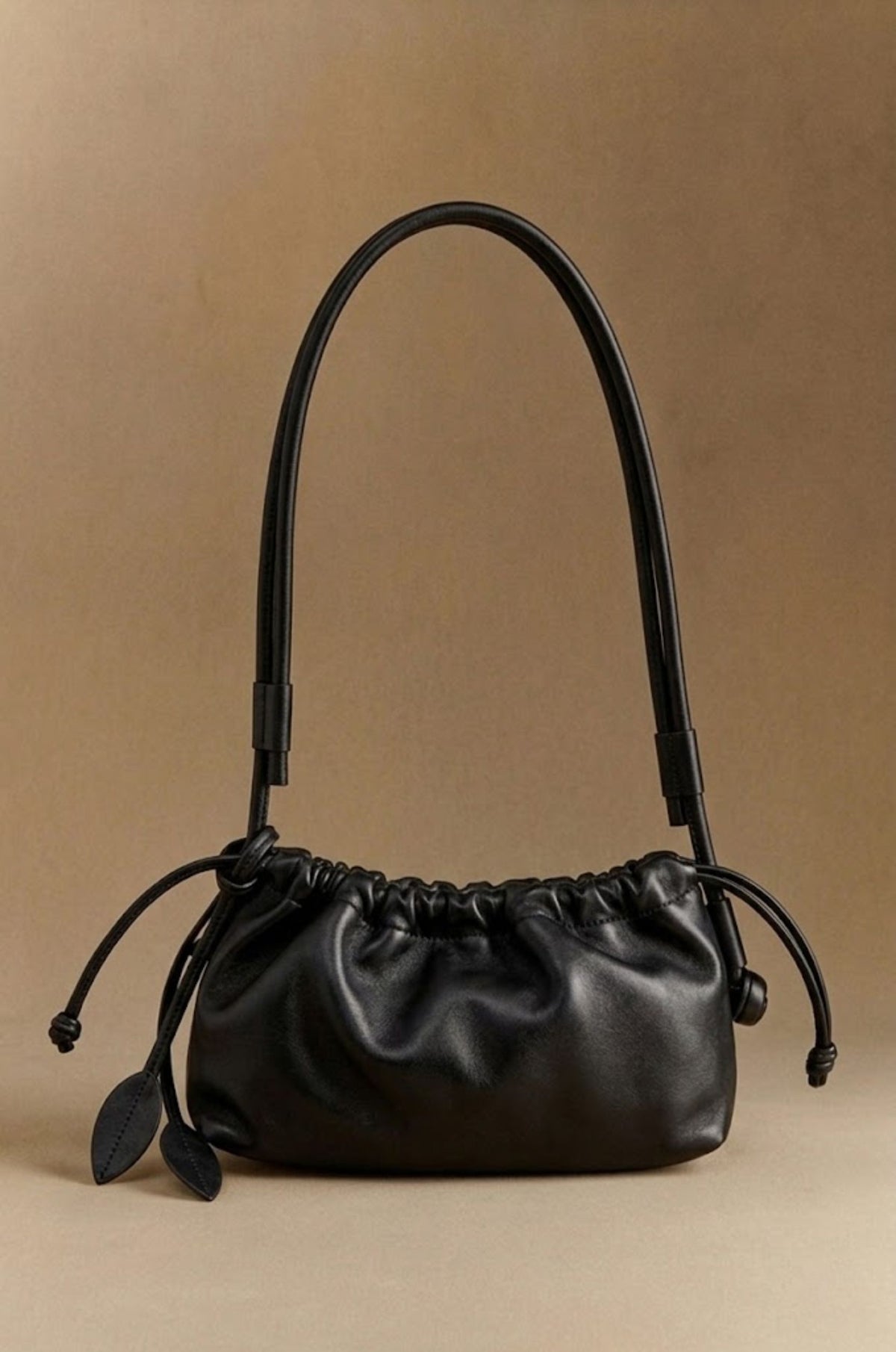 Eva Grande leather laptop bag in black, front view — Biche Maison Dréan
