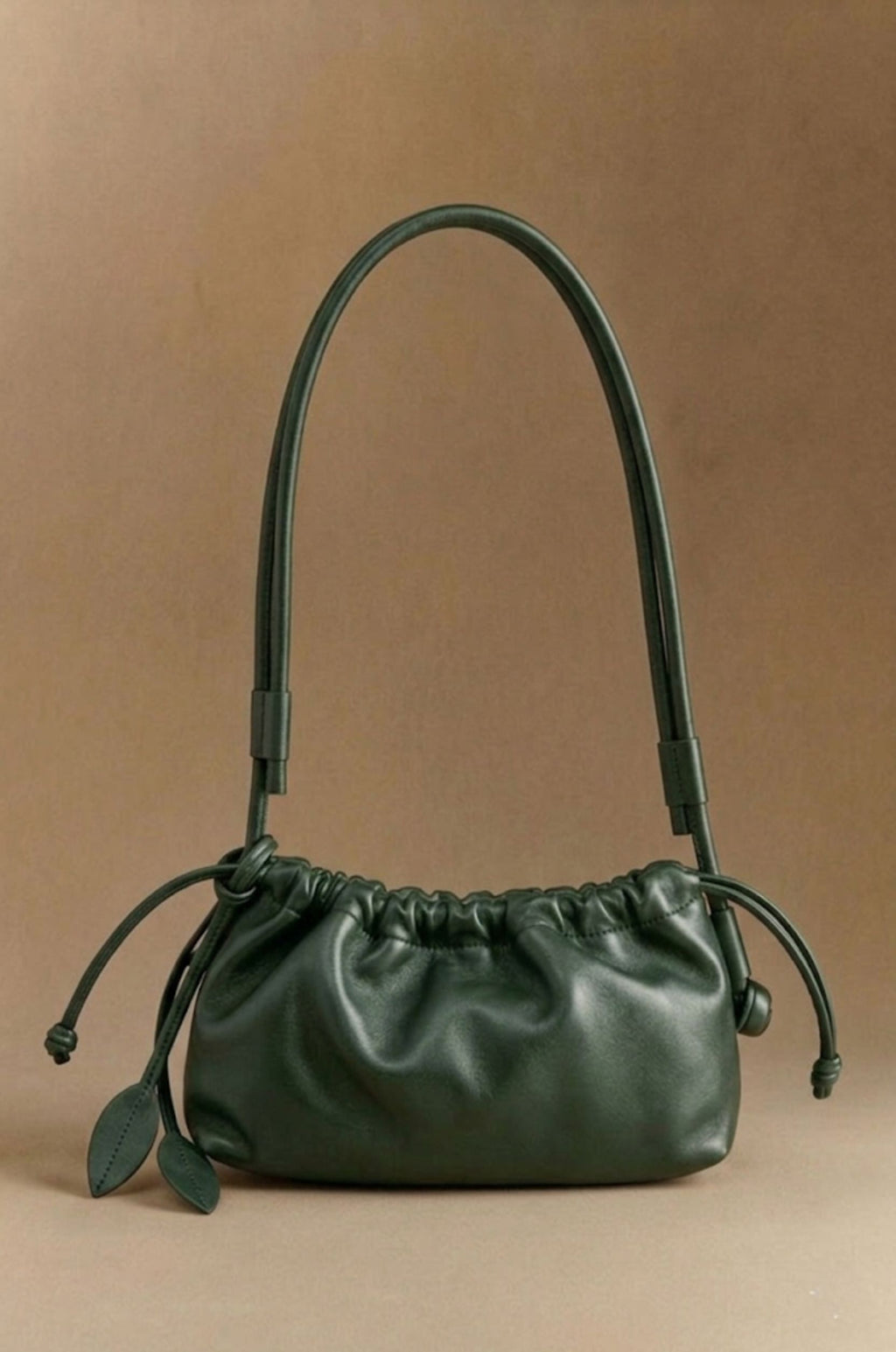 Eva Grande leather laptop bag in green, front view — Biche Maison Dréan
