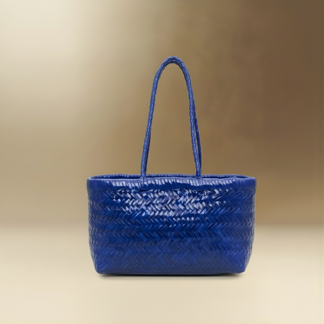 Panier Medium handwoven buffalo leather basket bag in blue, front view — Biche Maison Dréan
