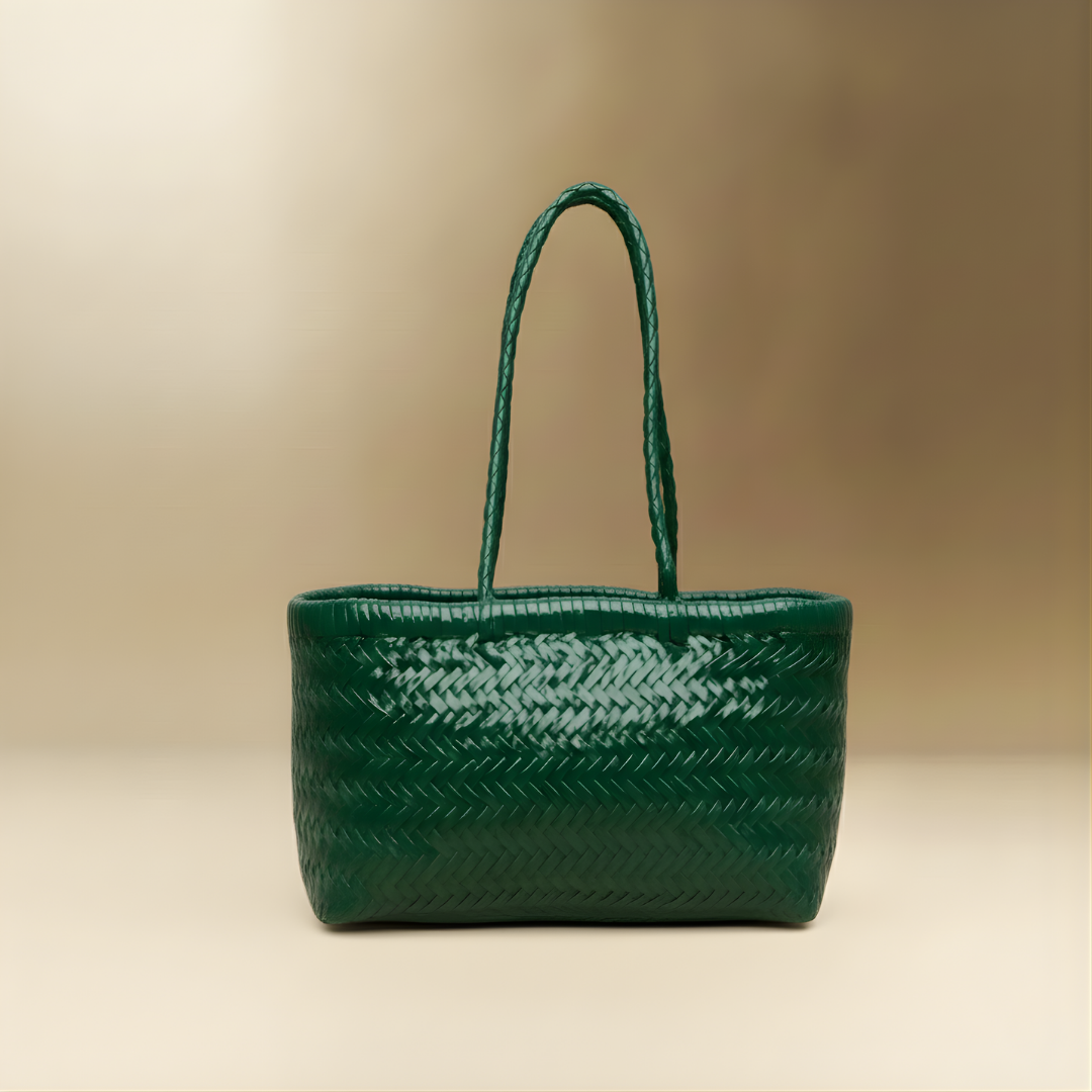 Panier Medium handwoven buffalo leather basket bag in green, front view — Biche Maison Dréan
