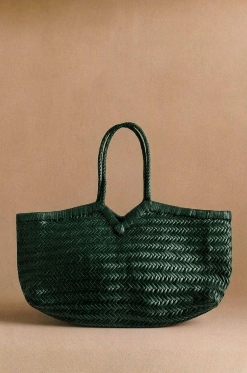 Panier V handwoven leather basket bag in green, front view — Biche Maison Dréan
